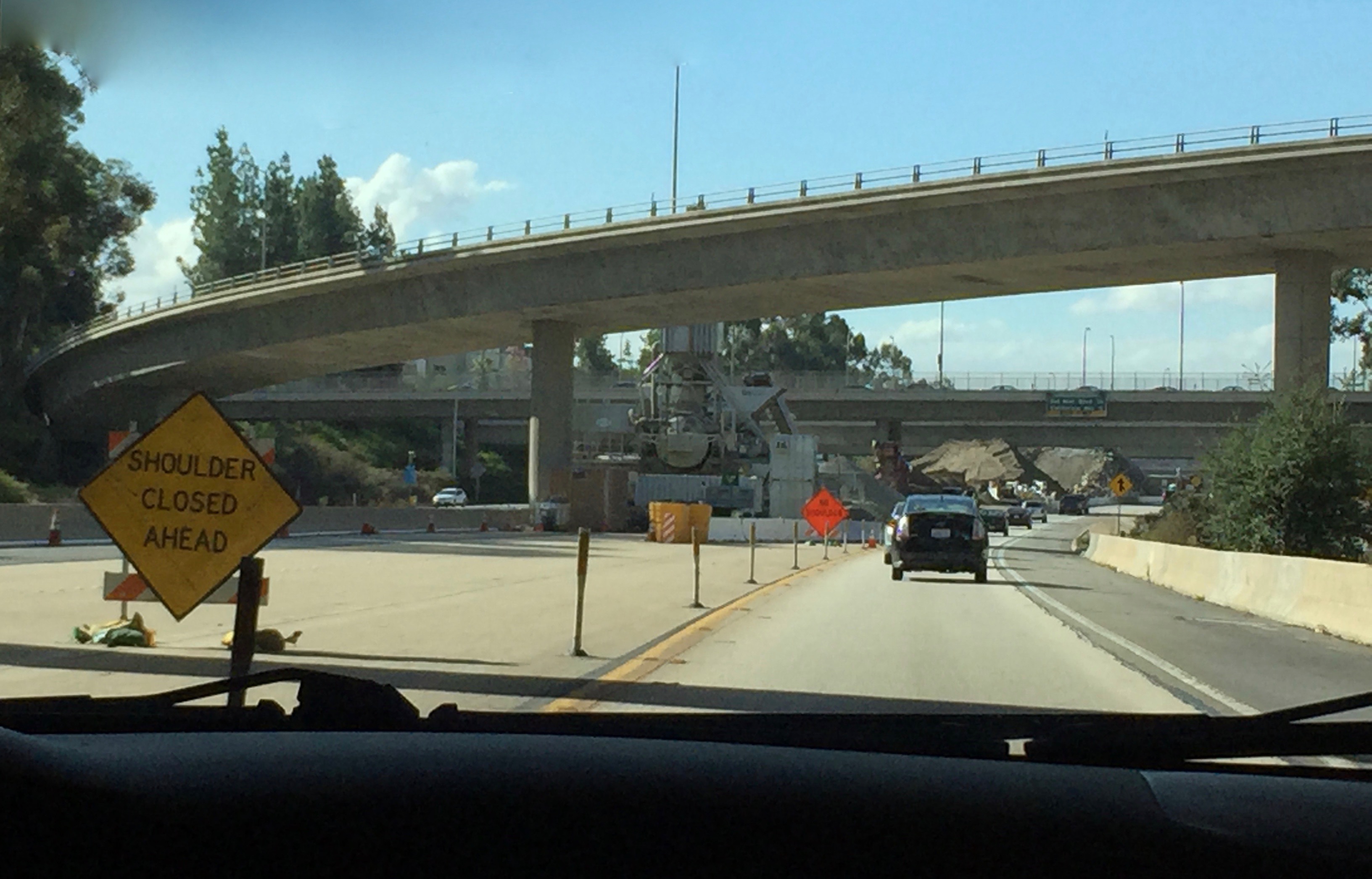 Looking south on the unfinished northern stub of the 710 in Pasadena, with dormant construction equipment in the median